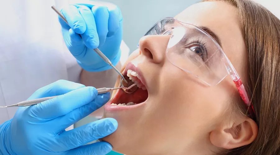 Young woman having dental exam